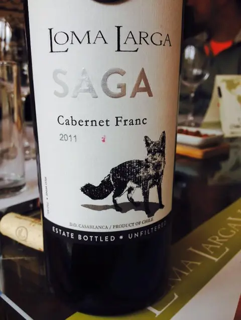 Bottle of Loma Larga Saga Cabernet Franc 2011 on a tasting table, Casablanca Valley